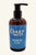 A bottle of Crazy Water Massage Oil with a pump dispenser, labeled 'Relaxing'. The bottle is brown with a blue label and black cap.